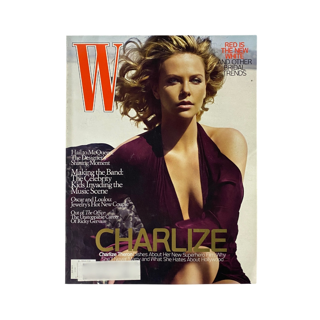 W Magazine June 2008 cover featuring actress Charlize Theron in a striking pose, showcasing fashion and celebrity culture.