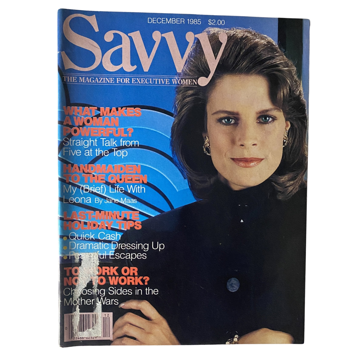 Savvy Magazine December 1985 cover featuring an executive woman with a confident expression, showcasing articles on empowering women, leadership, and holiday tips. Noteworthy article titled 'Handmaiden to the Queen' by Jane Maas.