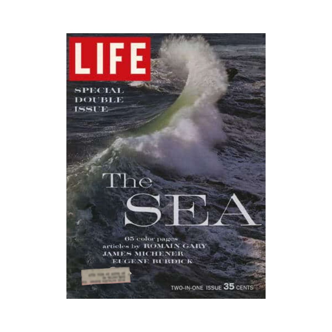 Front cover of the VTG Life Magazine December 21, 1962, titled 'The Sea', showcasing a dramatic wave. This special double issue features articles by Romain Gary, James Michener, and Eugene Burdick, reflecting 1960s themes in marine exploration.