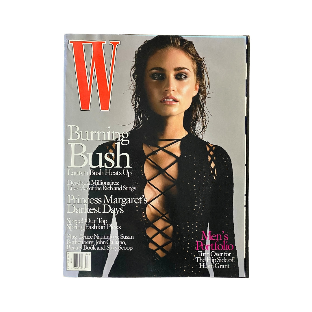 W Magazine April 2002 cover featuring businesswoman Lauren Bush, showcasing her dramatic look and striking fashion.