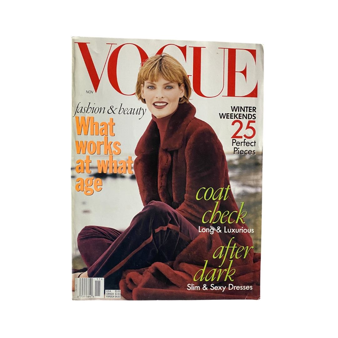Vogue Magazine November 1996 featuring a model on the cover in winter attire, highlighting the theme 'What Works at What Age' with additional text on 'Coat Check' and 'After Dark' styles. Vintage fashion magazine in good condition.