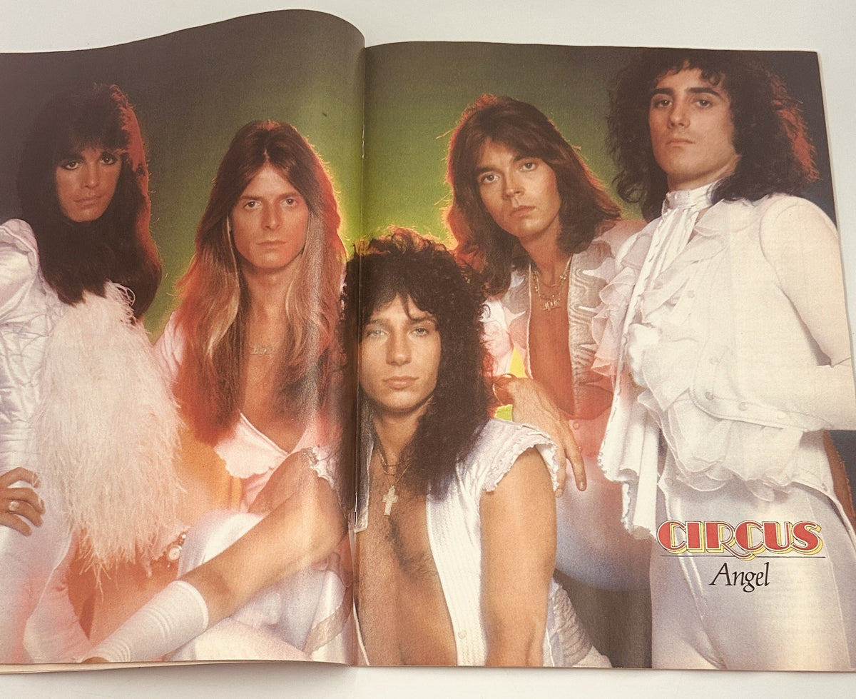 Circus Magazine April 13, 1978 featuring the band Angel, showcasing five members in stylish outfits with vibrant lighting and colorful background.