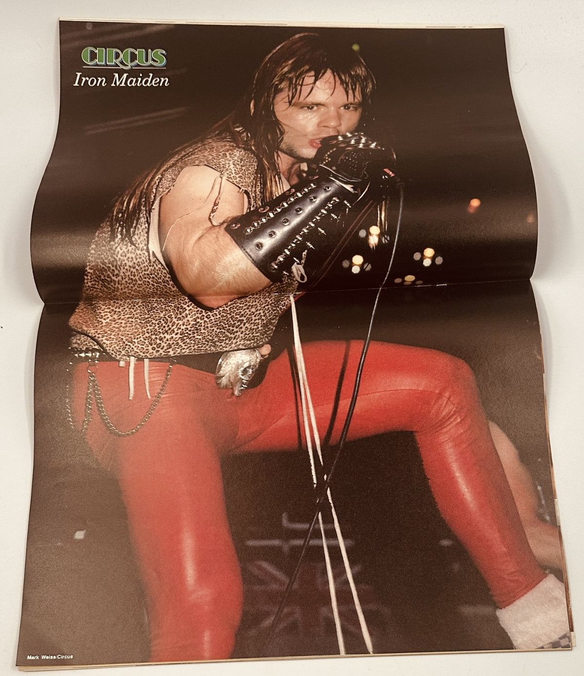 Iron Maiden poster from Circus Magazine January 31, 1984 showcasing the band member in a performance.