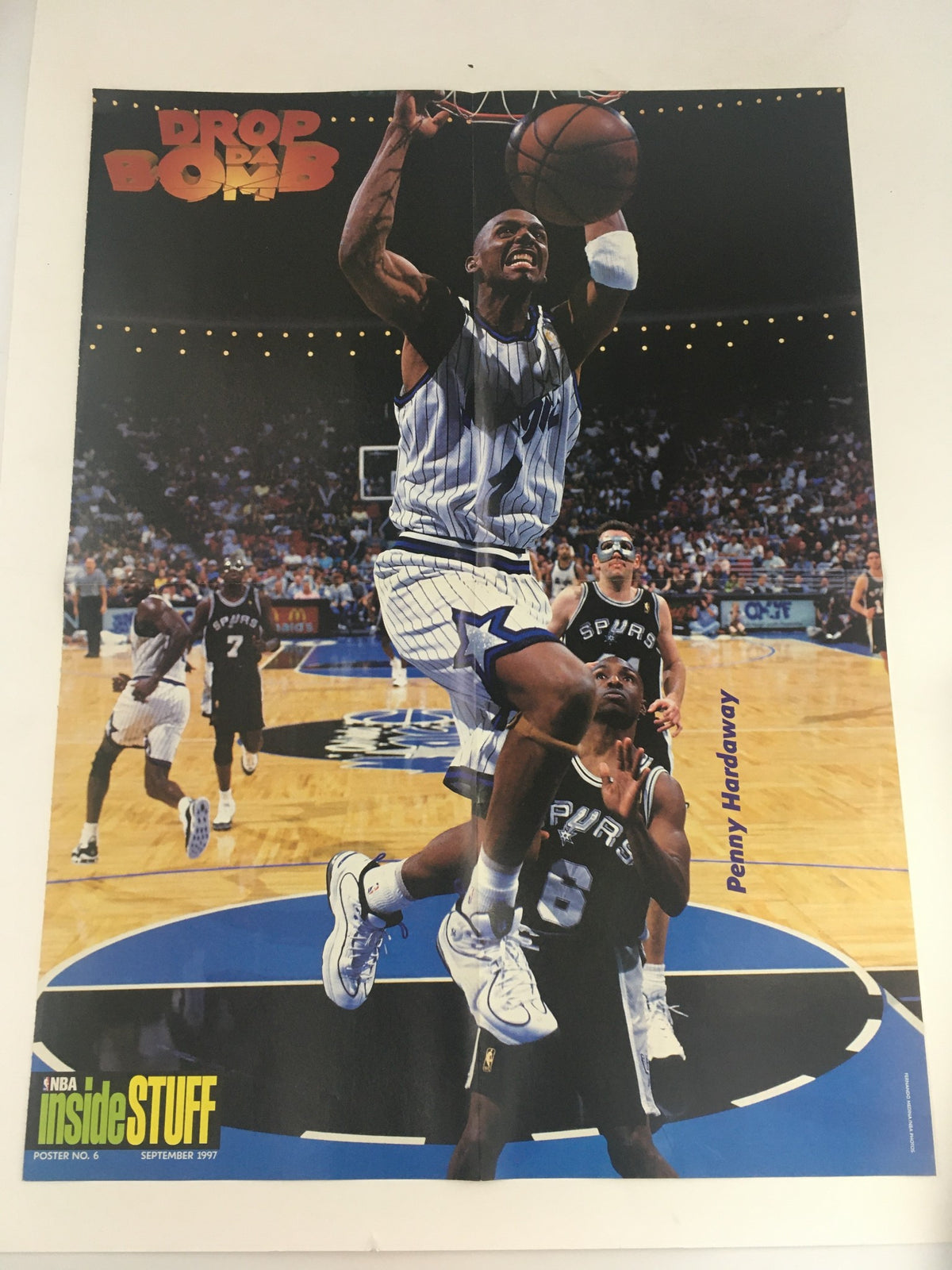 Poster included in Inside Stuff Magazine September 1997, depicting Penny Hardaway in action during a game, capturing the dynamic energy of 90s basketball.