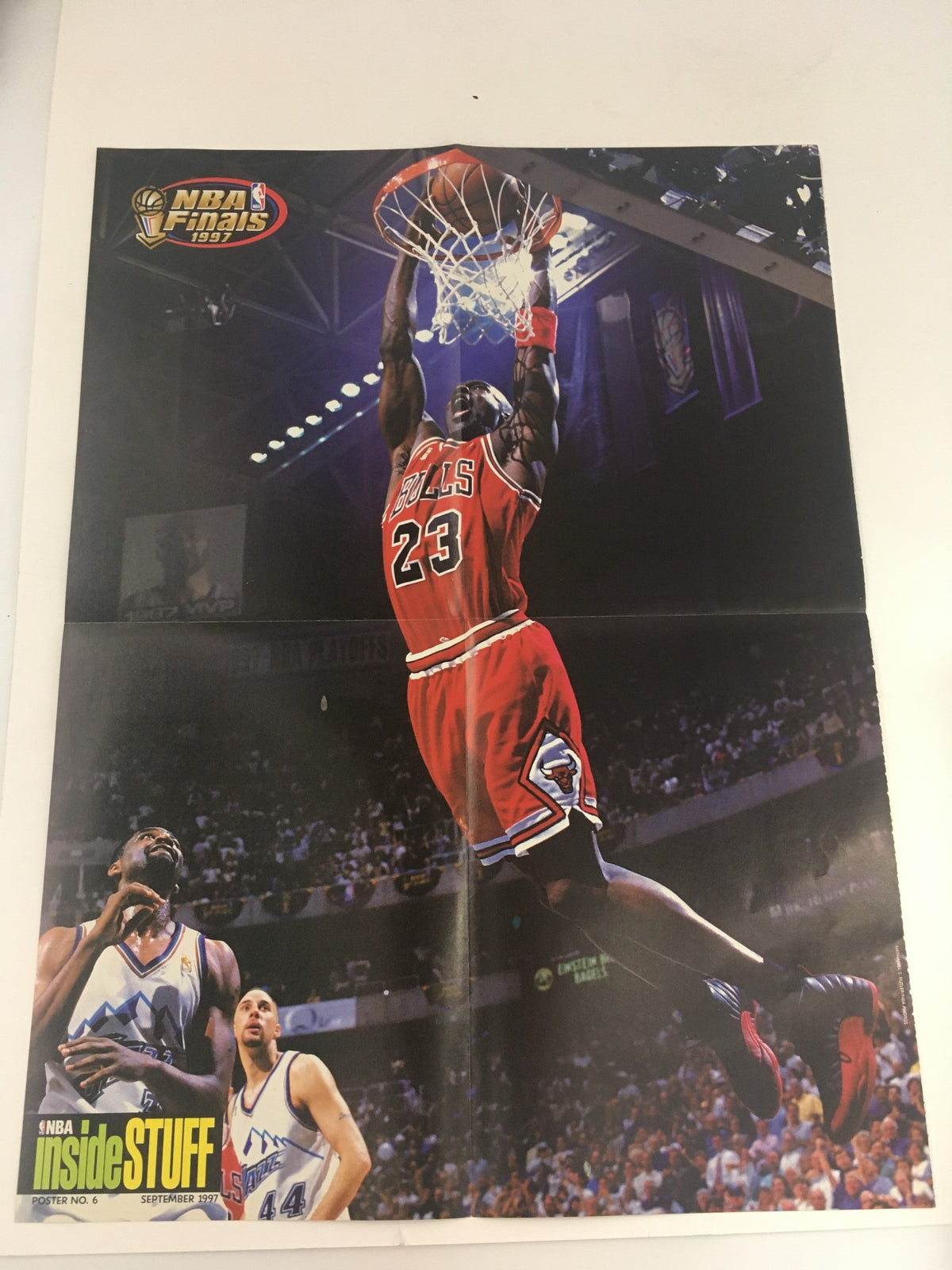 Inside Stuff Magazine September 1997 featuring a dramatic poster of NBA Finals action with Michael Jordan dunking. A must-have collectible for basketball fans.