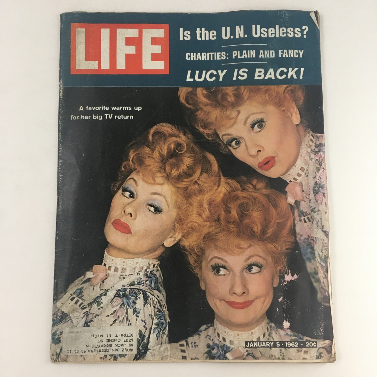 Cover of Life Magazine from January 5, 1962, featuring actress Lucille Ball in a colorful costume with her signature red curls, promoting her return to television and discussing charitable efforts.