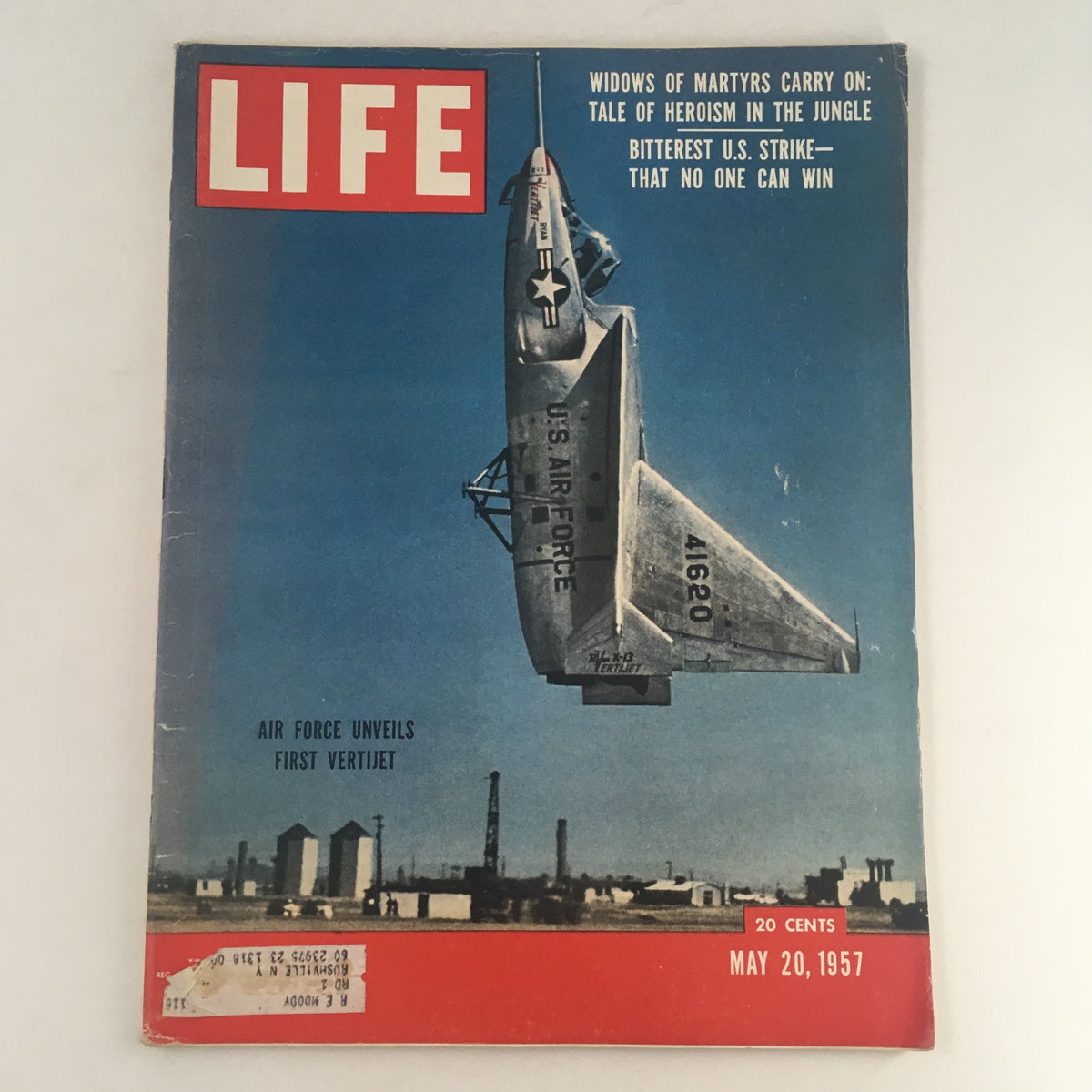Cover of Life Magazine from May 20, 1957 featuring the title 'Air Force Unveils First Vertijet & Bitterest US Strike'. The image showcases a revolutionary aircraft in flight against a blue sky, highlighting advancements in aviation technology.