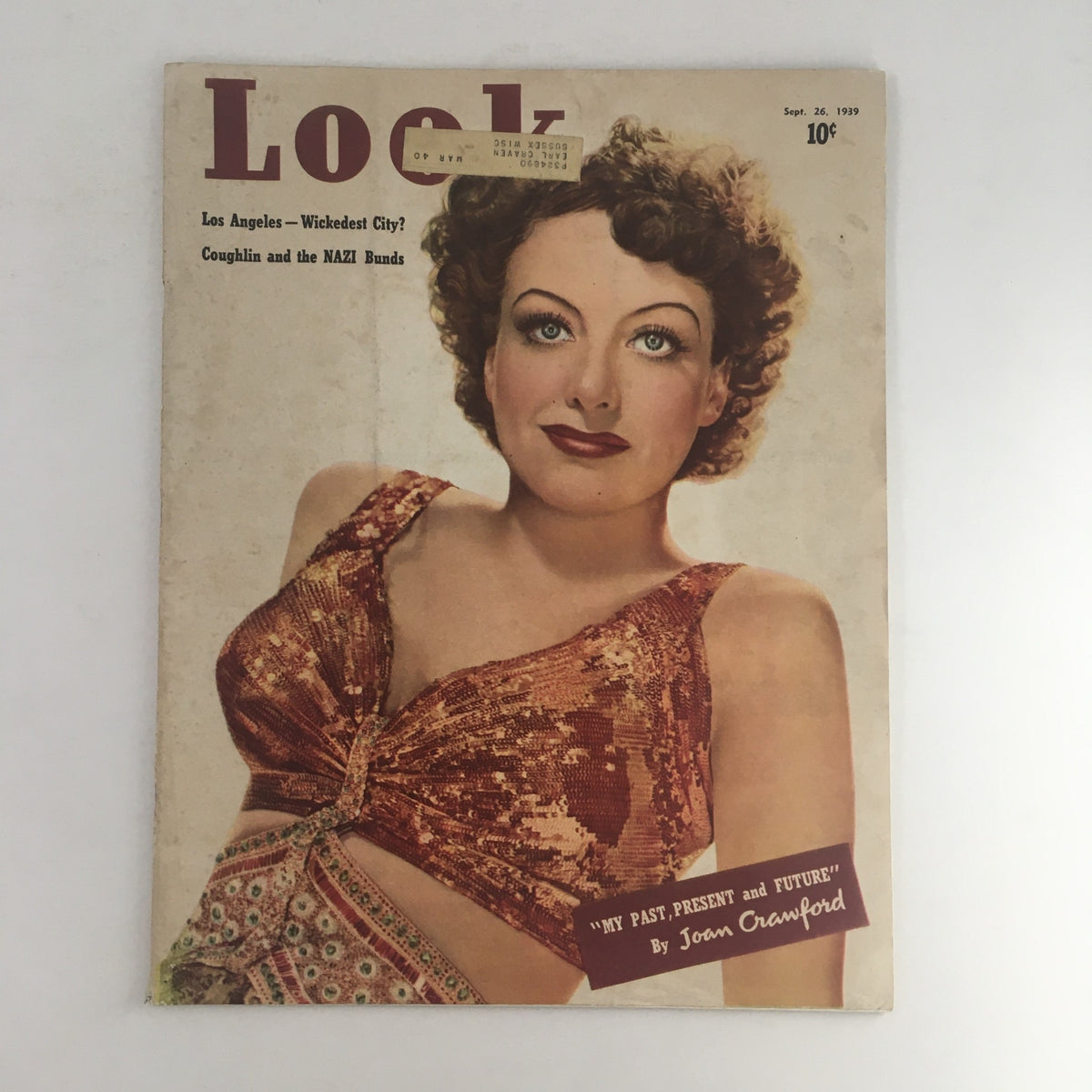 Look Magazine September 26, 1939 cover featuring Joan Crawford, showcasing her in a glamorous outfit with emphasis on her article 'My Past, Present and Future'.