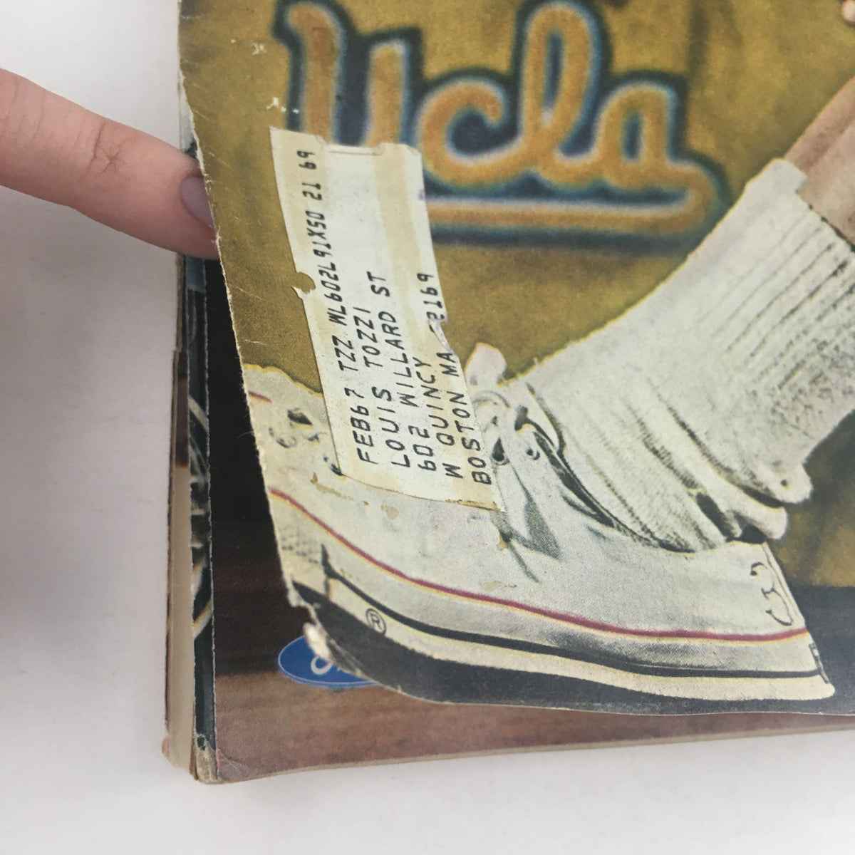 Close-up of the edge of the Sports Illustrated Magazine December 5 1966, revealing an address label on the cover, with the title 'The New Superstar' related to College Basketball.