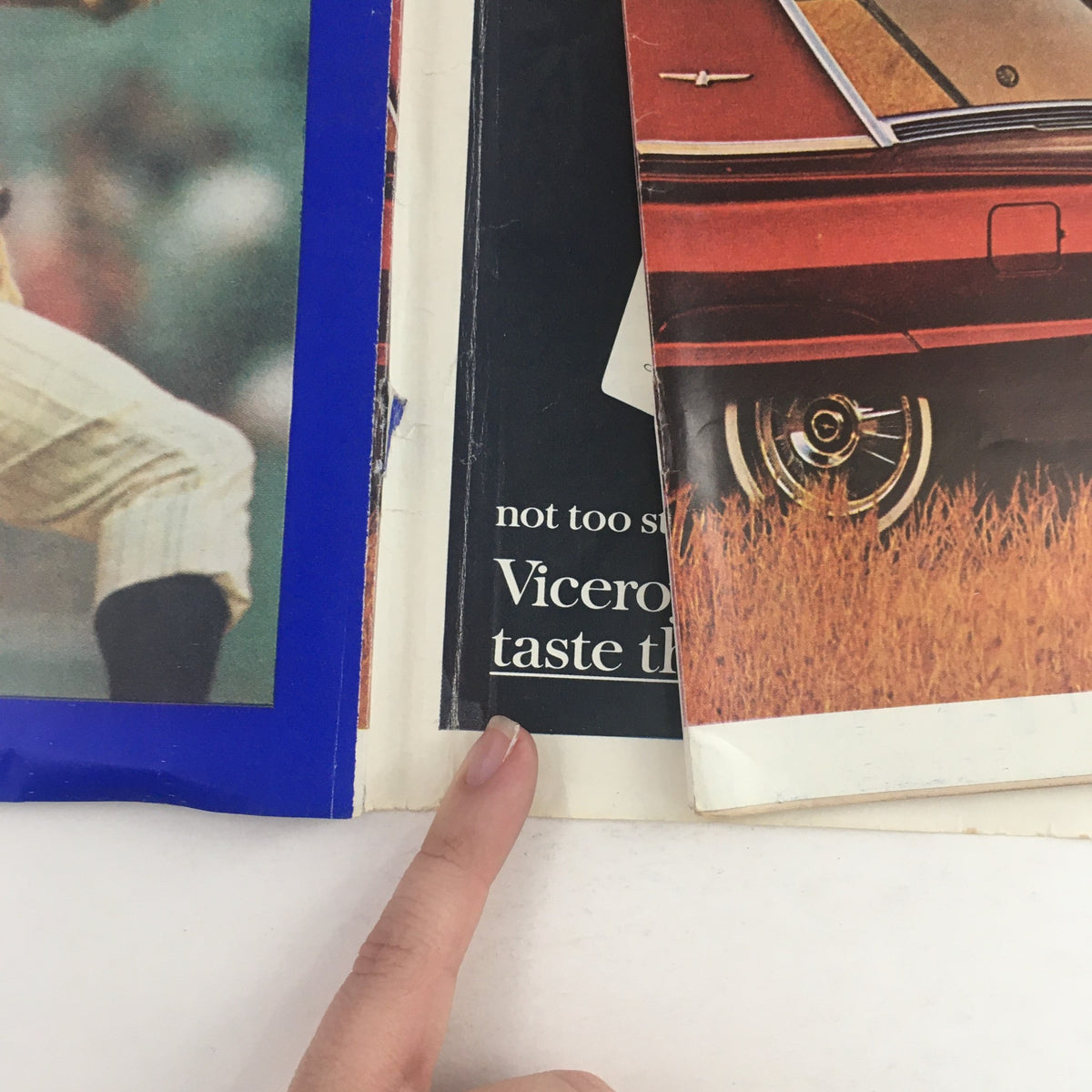 Interior view of the Sports Illustrated Magazine September 30, 1963, showing advertisements and pages featuring Whitey Ford and the New York Yankees.