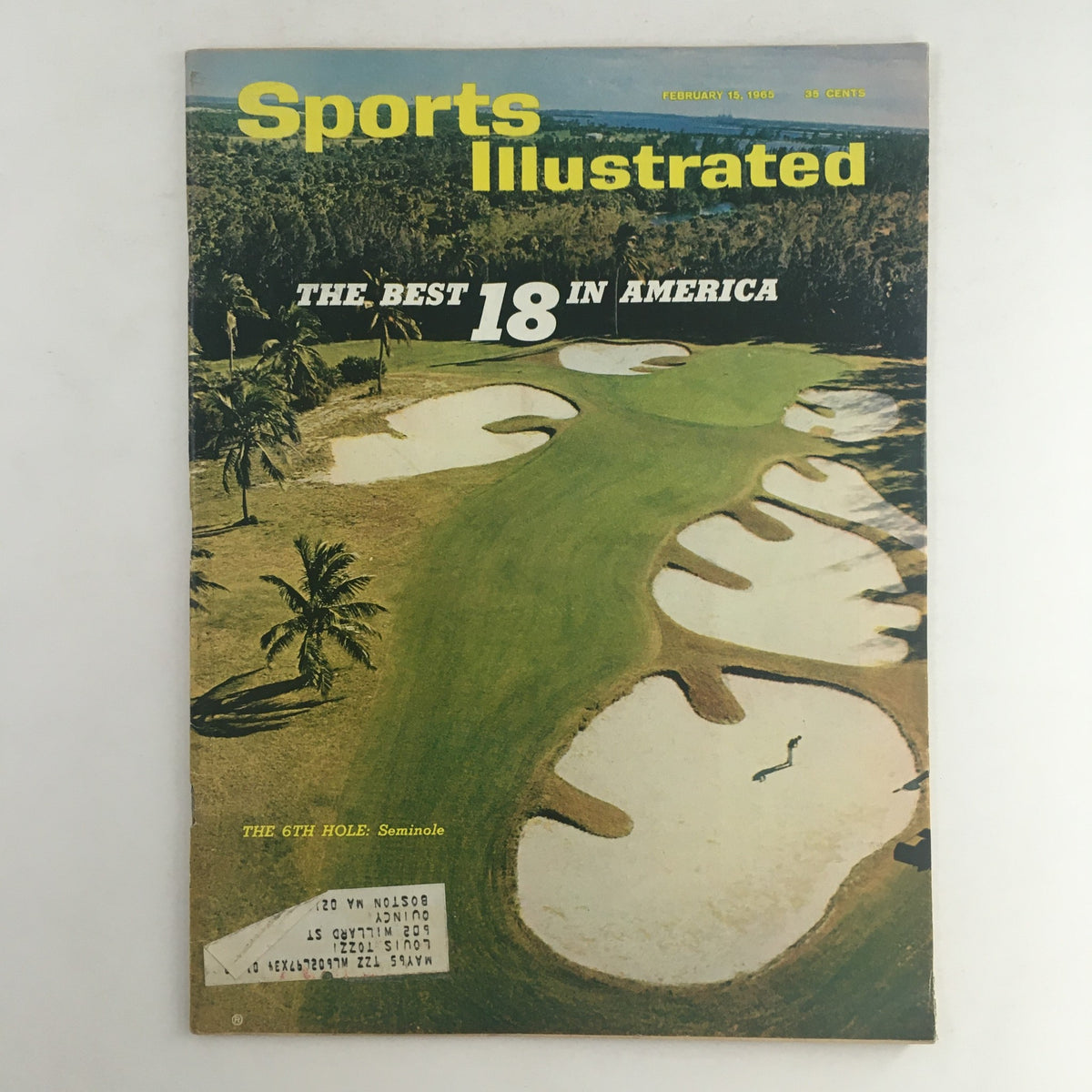 Vintage Sports Illustrated Magazine cover from February 15, 1965, showcasing the article 'The 6th Hole in Seminole', featuring a scenic aerial view of a golf course with sand traps and palm trees, emphasizing its historical value for golf enthusiasts.