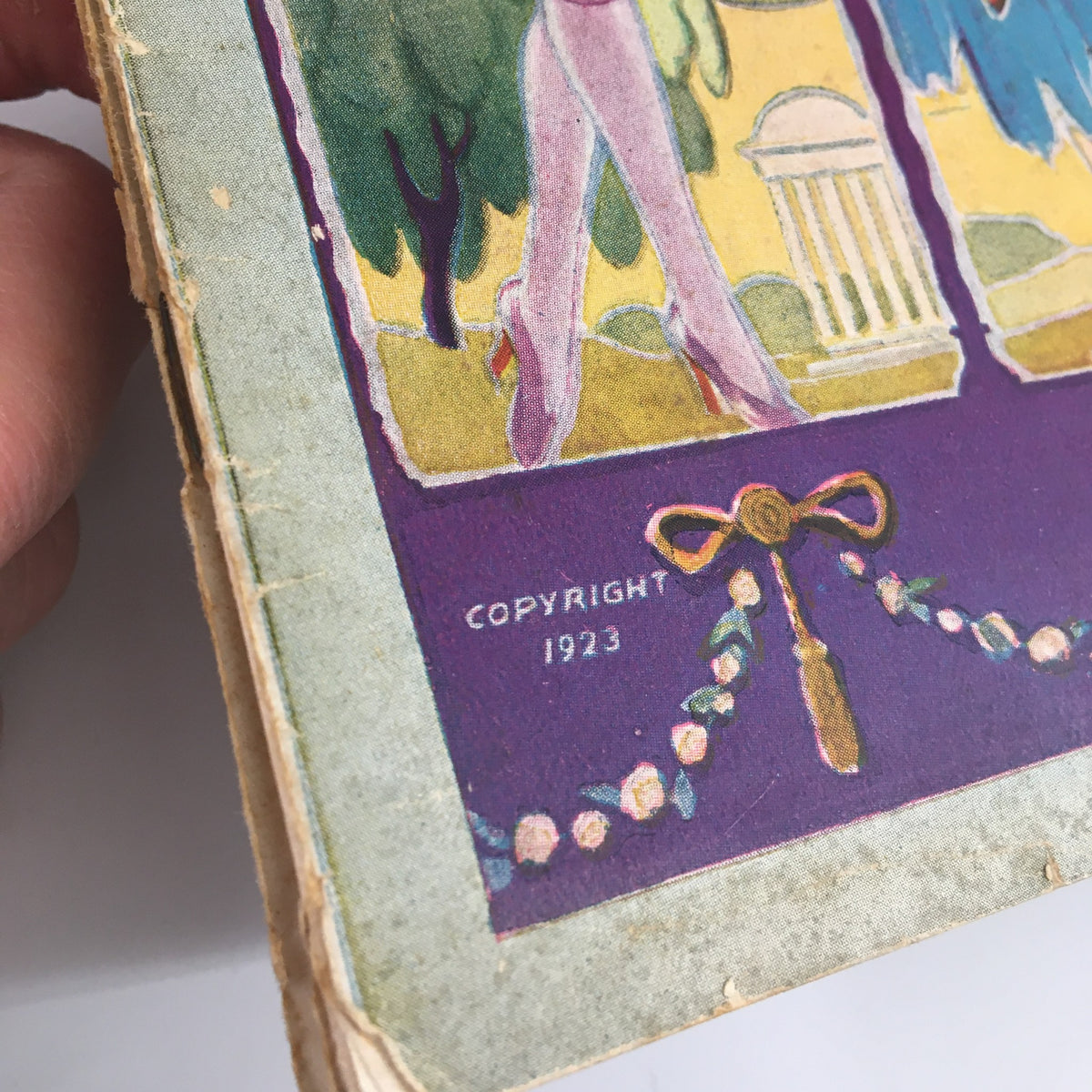 Cover detail of the 1923 B.F. Keith's Hippodrome Two Sailors and A Girl Souvenir Program showcasing colorful theatrical artwork and historical copyright information.