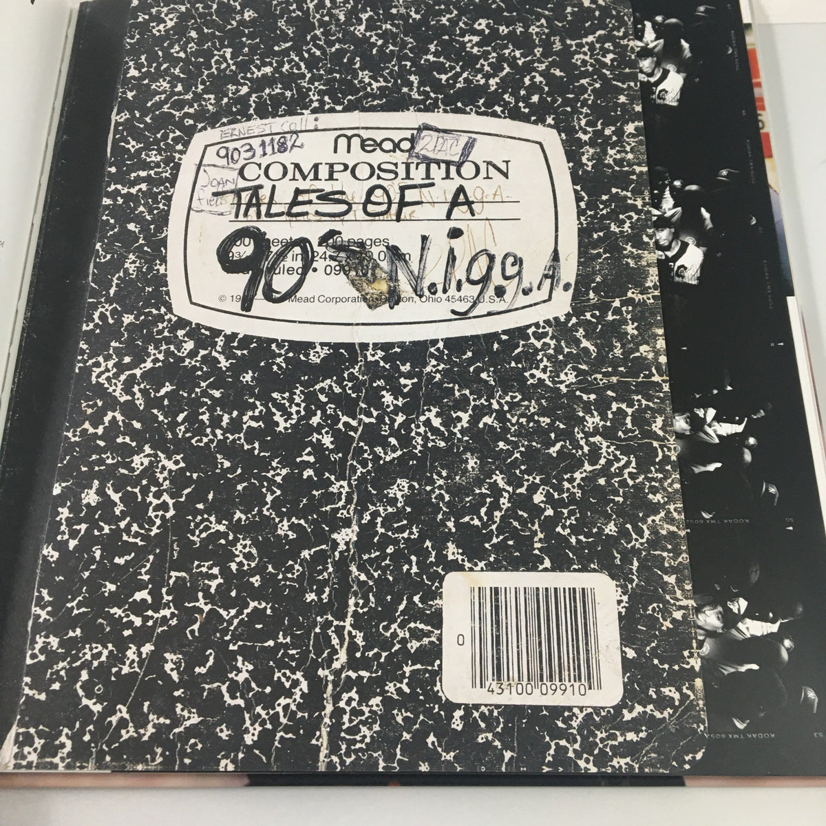 The back cover of 'Tupac Shakur Legacy Includes A 60-Minute Interview Co Book by Jamal Joseph', displaying a classic Mead composition book design with label.