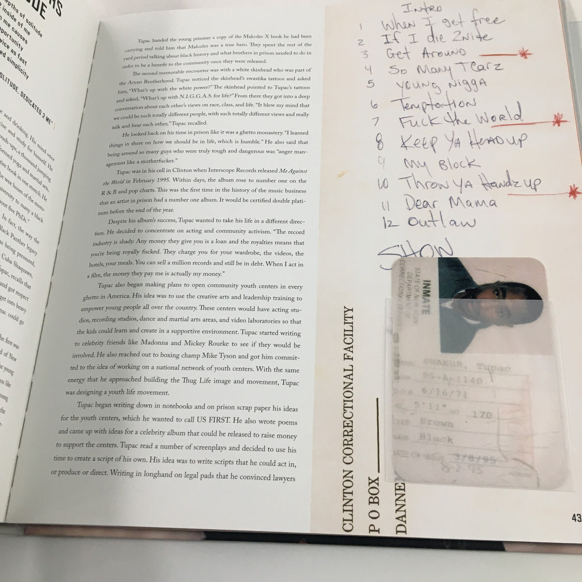 An interior page from 'Tupac Shakur Legacy Includes A 60-Minute Interview Co Book by Jamal Joseph', featuring a list of Tupac's song titles written on paper.
