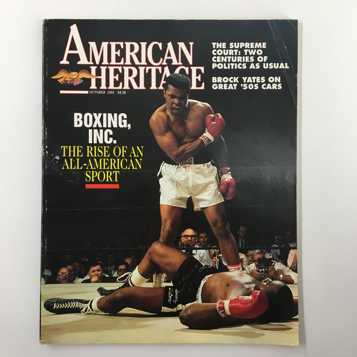 Cover of American Heritage magazine, October 1991, featuring Muhammad Ali vs Sonny Liston in a boxing match with the title 'Boxing, Inc. The Rise of an All-American Sport'.