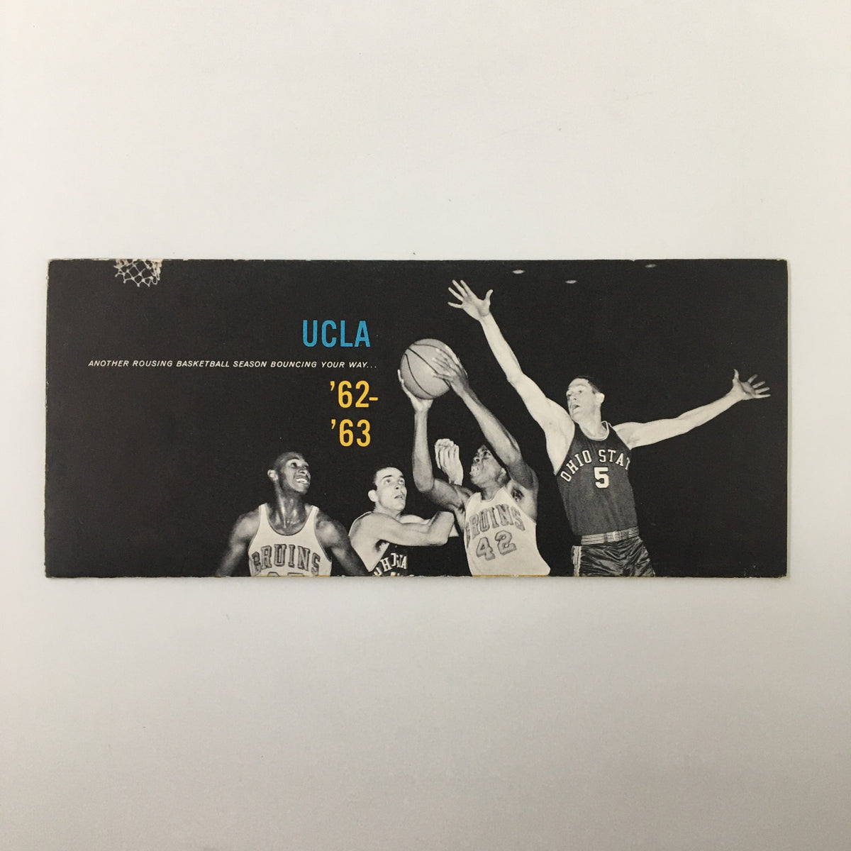 1962-1963 NCAA UCLA Bruins Basketball Ticket Application featuring players in action, showcasing the vintage design and historical significance of UCLA basketball memorabilia.