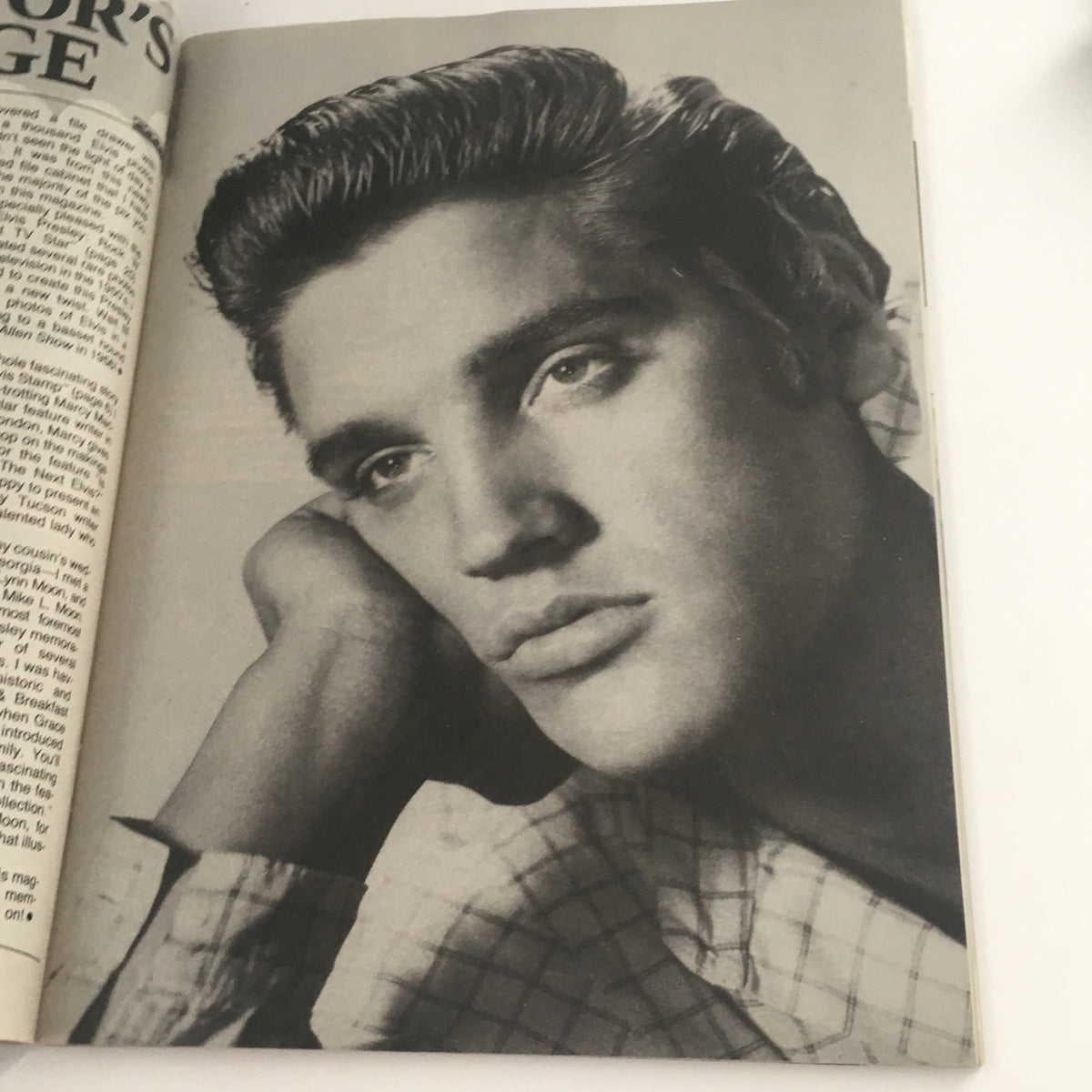 Black and white portrait of Elvis Presley in Movie Screen Yearbook #42, showcasing his youthful charm and iconic hairstyle.