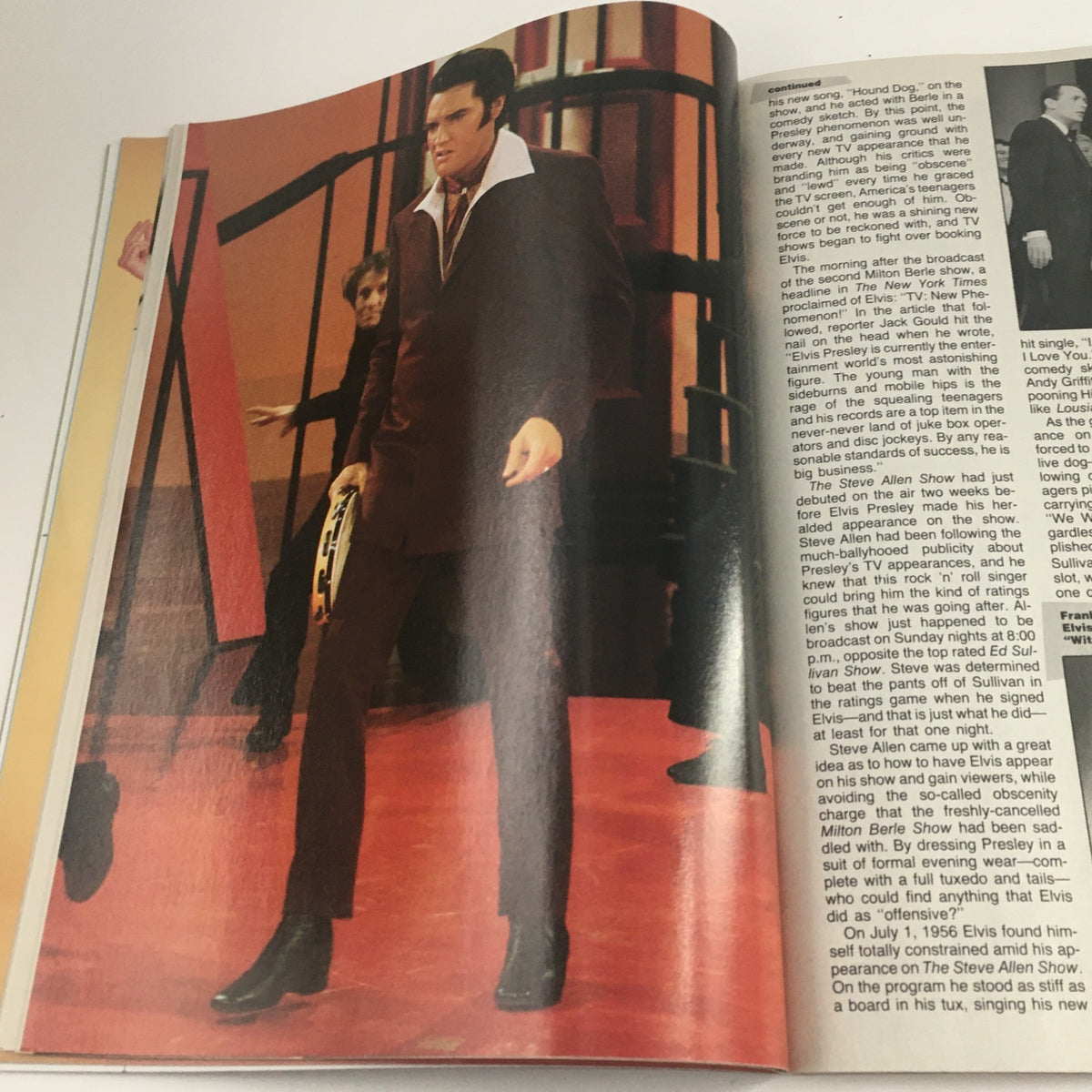 Elvis Presley performing on stage, captured in Movie Screen Yearbook #42, representing his dynamic presence during live performances.