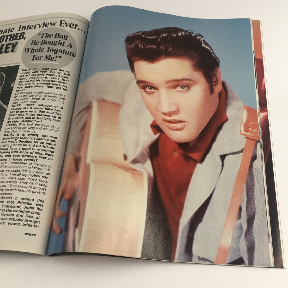 Portrait page from Movie Screen Yearbook #42 Elvis Presley The Complete History, featuring a color photo of Elvis Presley with an acoustic guitar, highlighting his style.