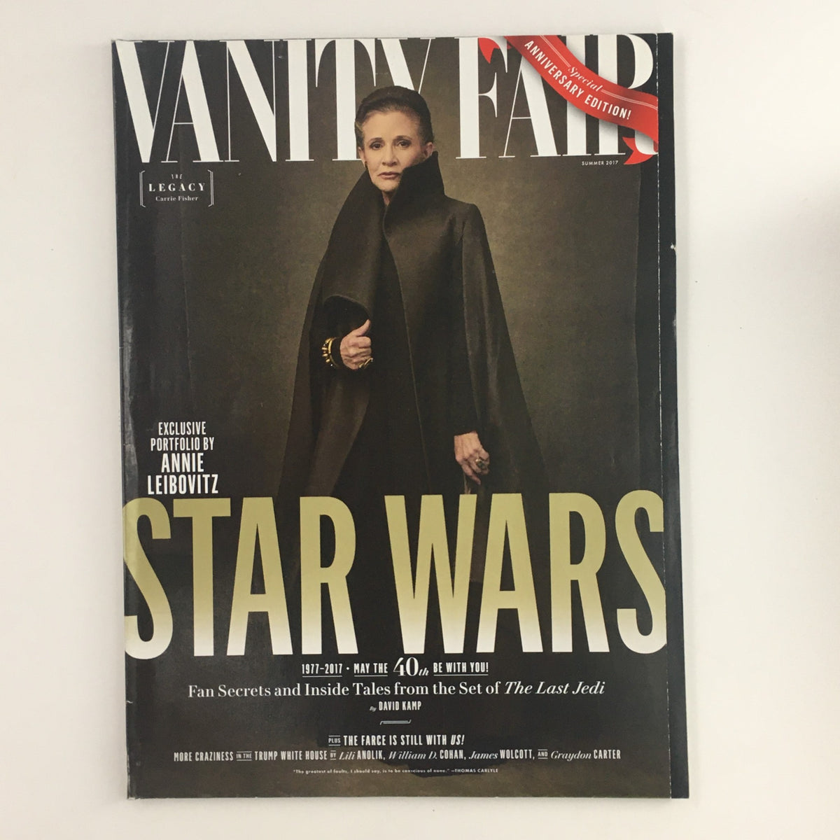 Vanity Fair Magazine Summer 2017 cover featuring Carrie Fisher in a black cloak with the title 'STAR WARS.' Celebrating 40 years of Star Wars with exclusive portfolio by Annie Leibovitz. Features the tagline 'Be with You!' and mentions fan secrets and behind-the-scenes stories from The Last Jedi.