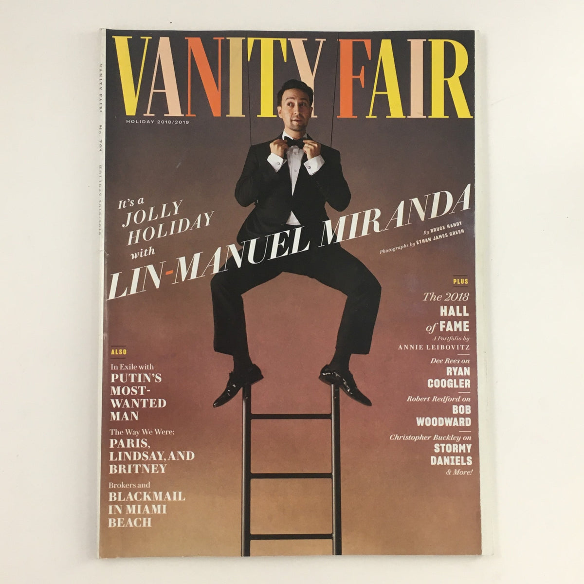 Vanity Fair Magazine Holiday 2018 featuring Lin-Manuel Miranda on the cover. The magazine highlights a jolly holiday theme with the talented artist, making it a collectible item for fans of pop culture.
