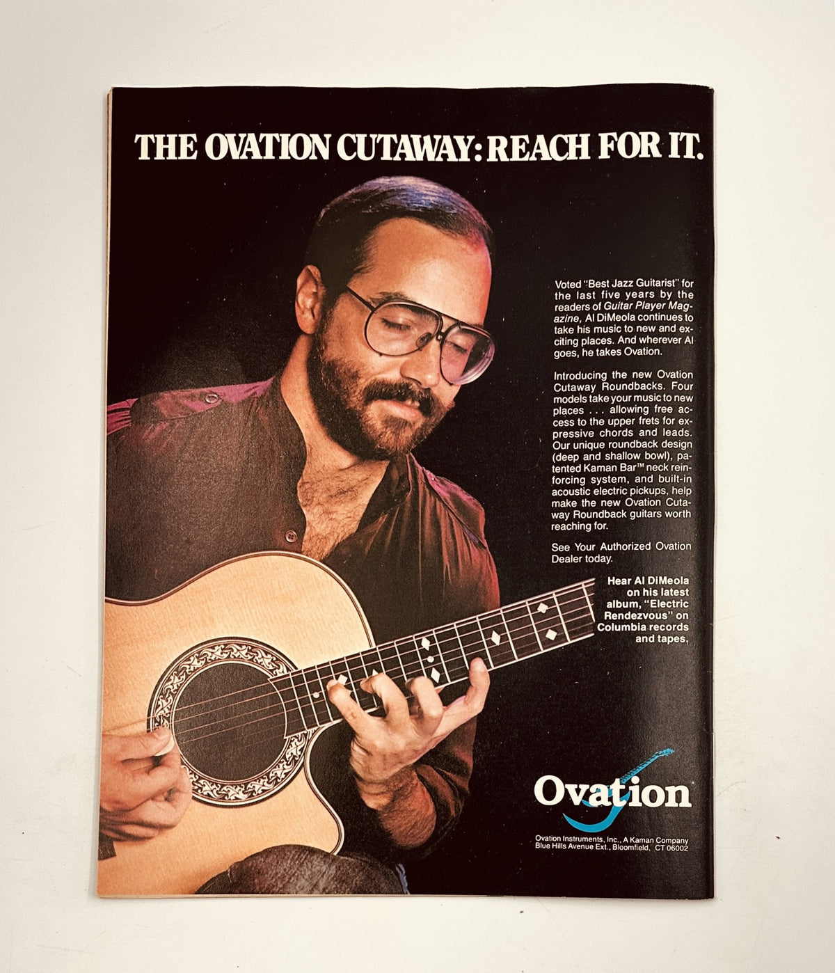 Advertisement for Ovation guitars, featuring a musician playing an Ovation Cutaway acoustic guitar, emphasizing its quality and design in Circus Magazine March 31, 1982.