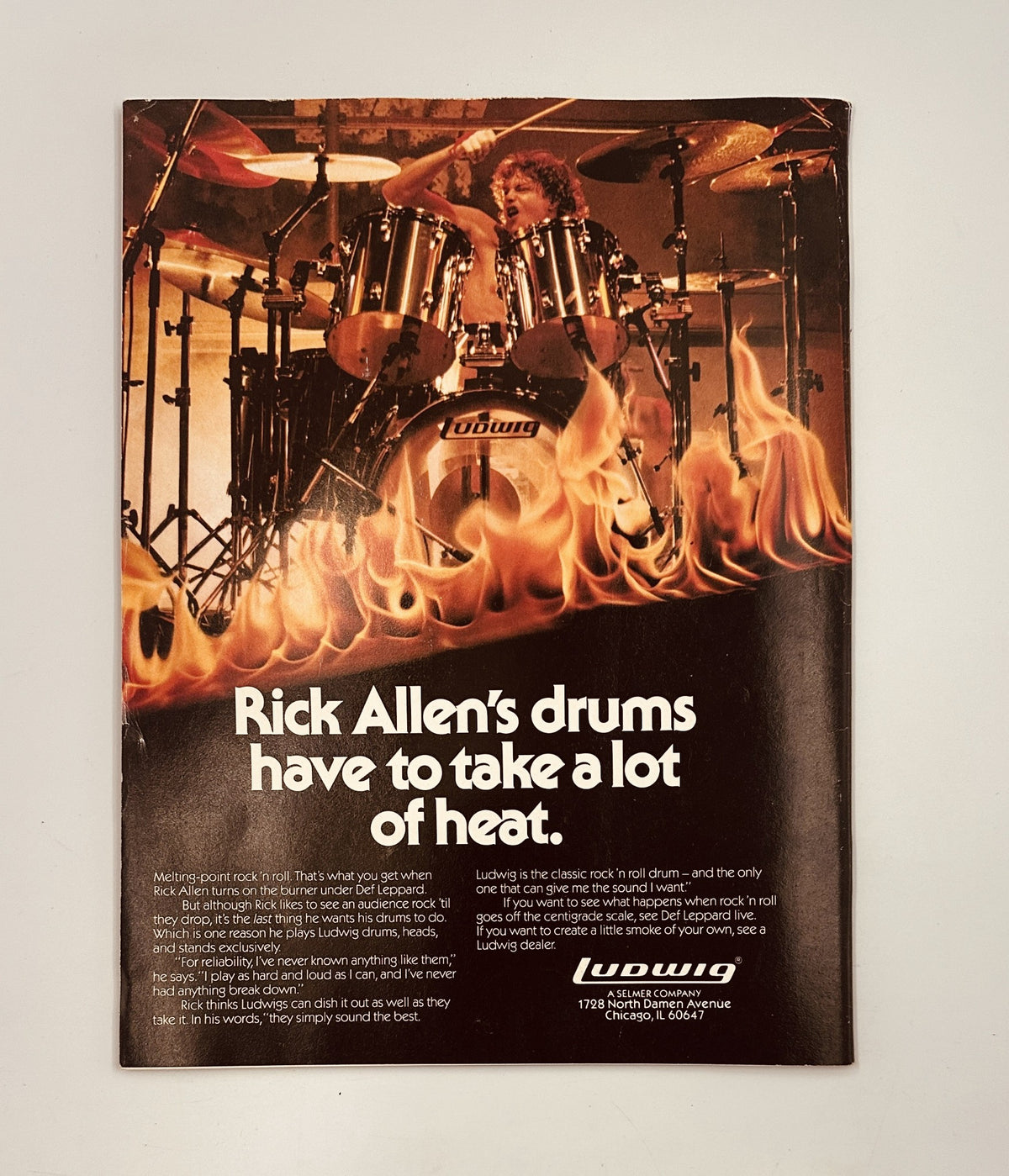 Circus Magazine February 29, 1984 advertisement featuring Rick Allen's drum set with the slogan 'Rick Allen’s drums have to take a lot of heat', emphasizing the renowned Ludwig brand in rock music.