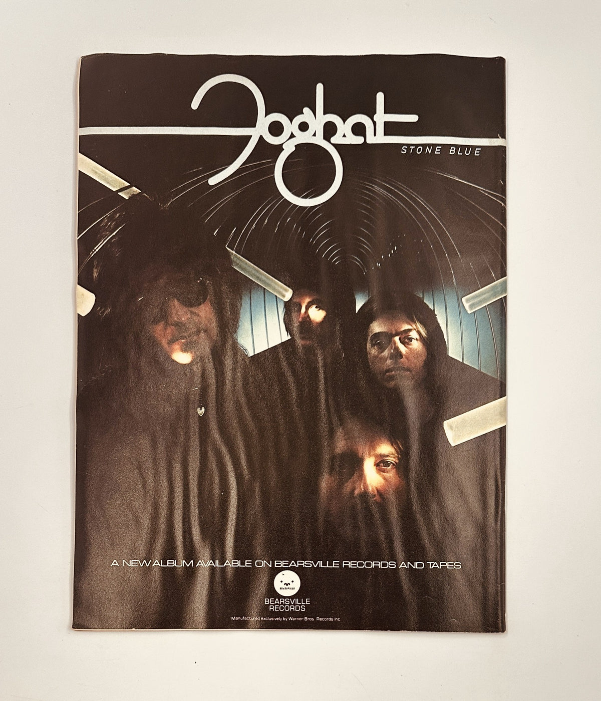Foghat band members on the cover of Stone Blue album, promoting their music in Circus Magazine June 22, 1978.