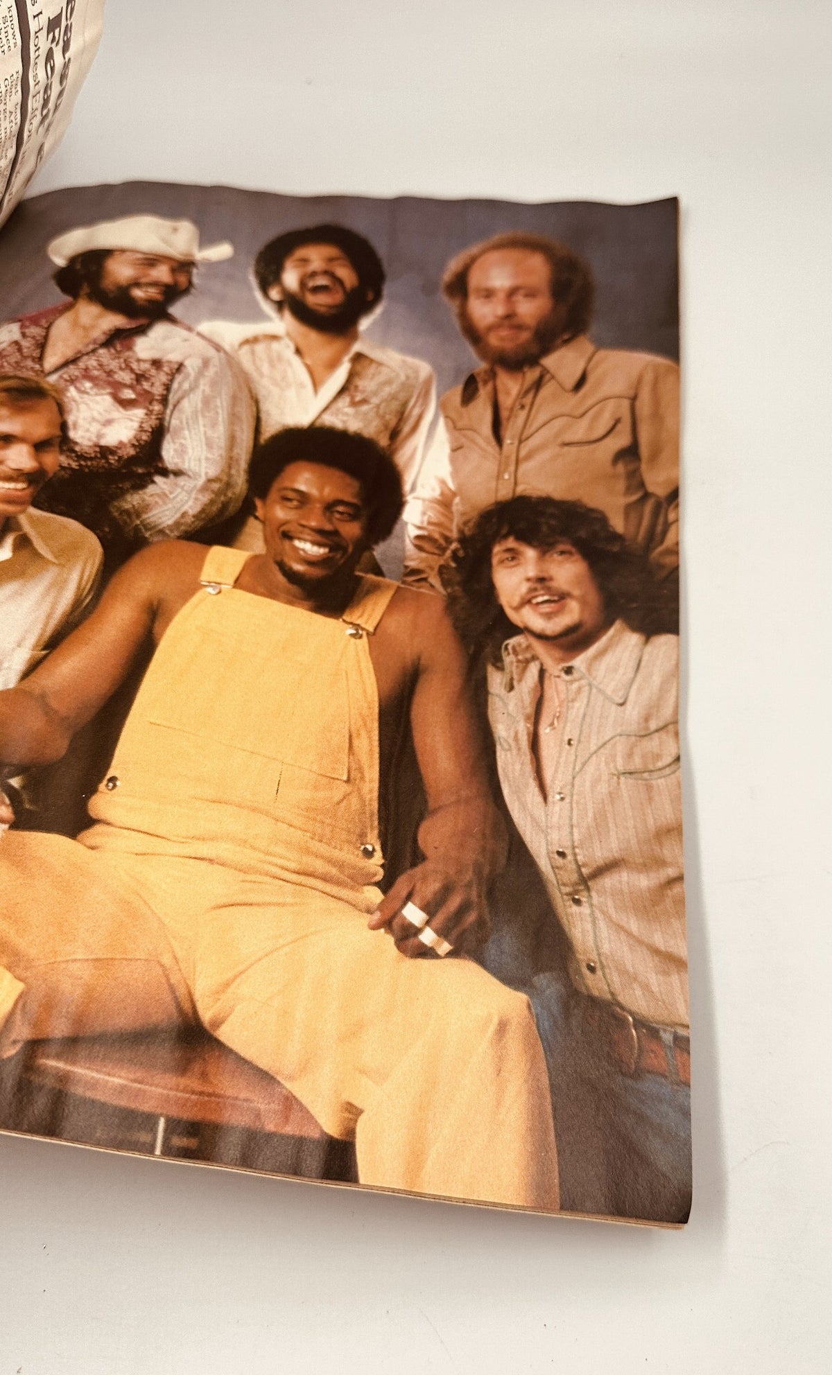 Group photo of musicians from the 1970s, showcasing a vintage aesthetic; from the Circus Magazine April 27, 1978 issue.