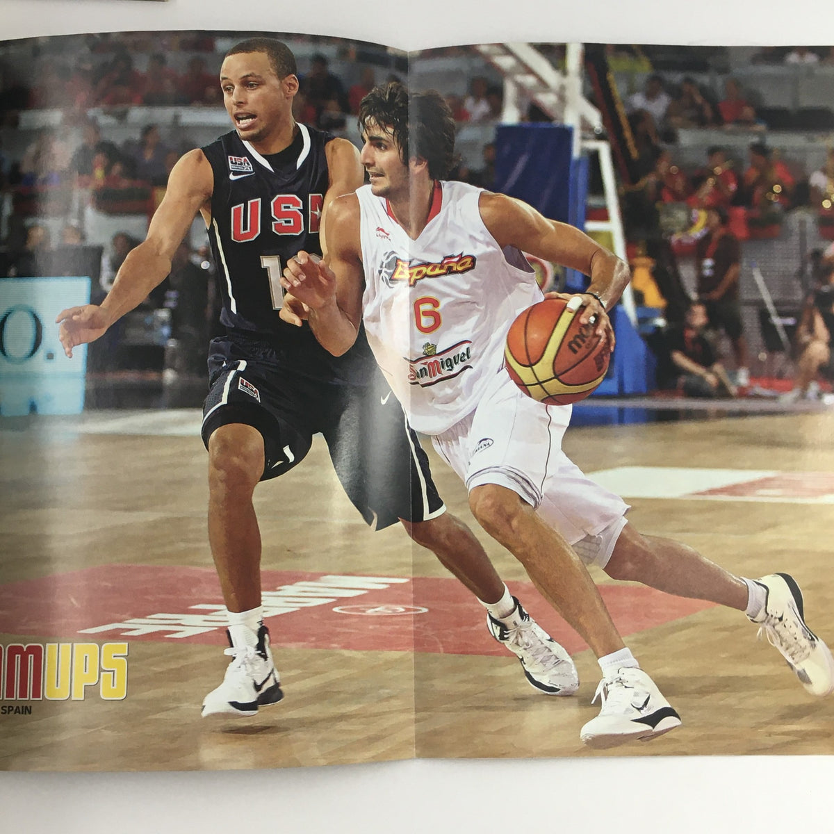 Inside page of Slam Magazine November 2010 displaying a basketball action shot with a player dribbling a ball, highlighting Stephen Curry's era in sports.