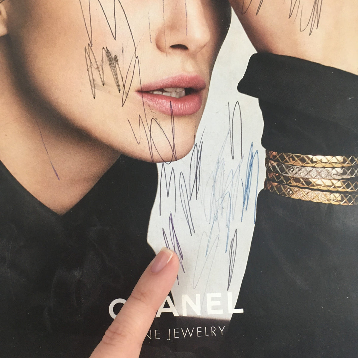 Altered cover image from Vanity Fair Magazine April 2017 featuring a model showcasing Chanel fine jewelry, with visible markings and scribbles.