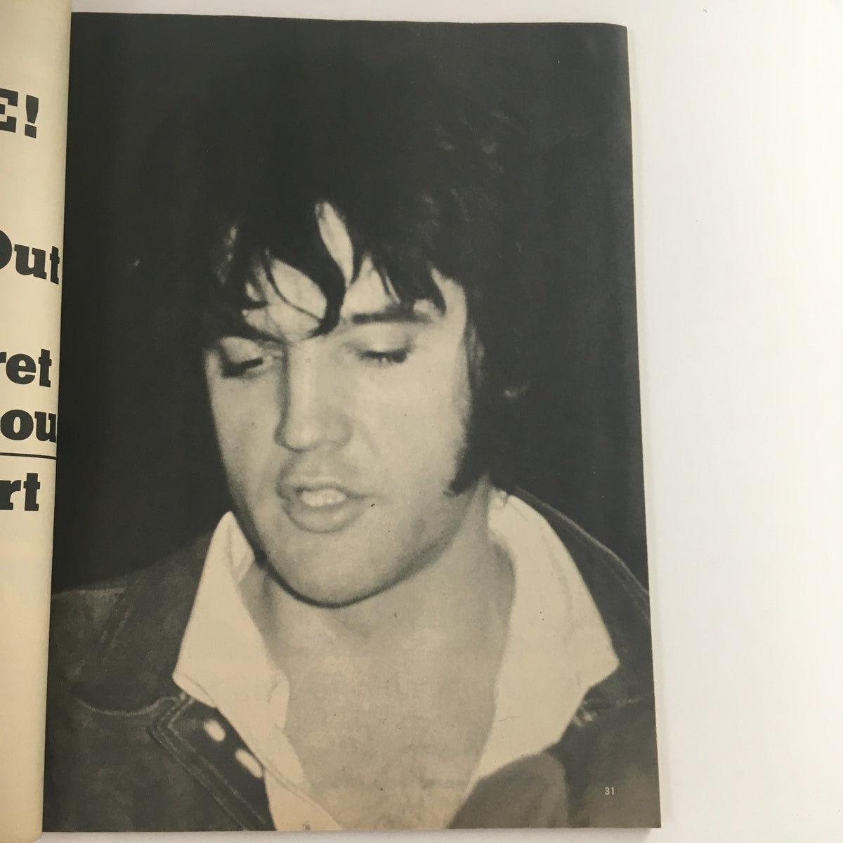 Inside page of Screen Stars Magazine June 1972 displaying a close-up black and white photograph of Elvis Presley, highlighting his classic hairstyle and fashion.