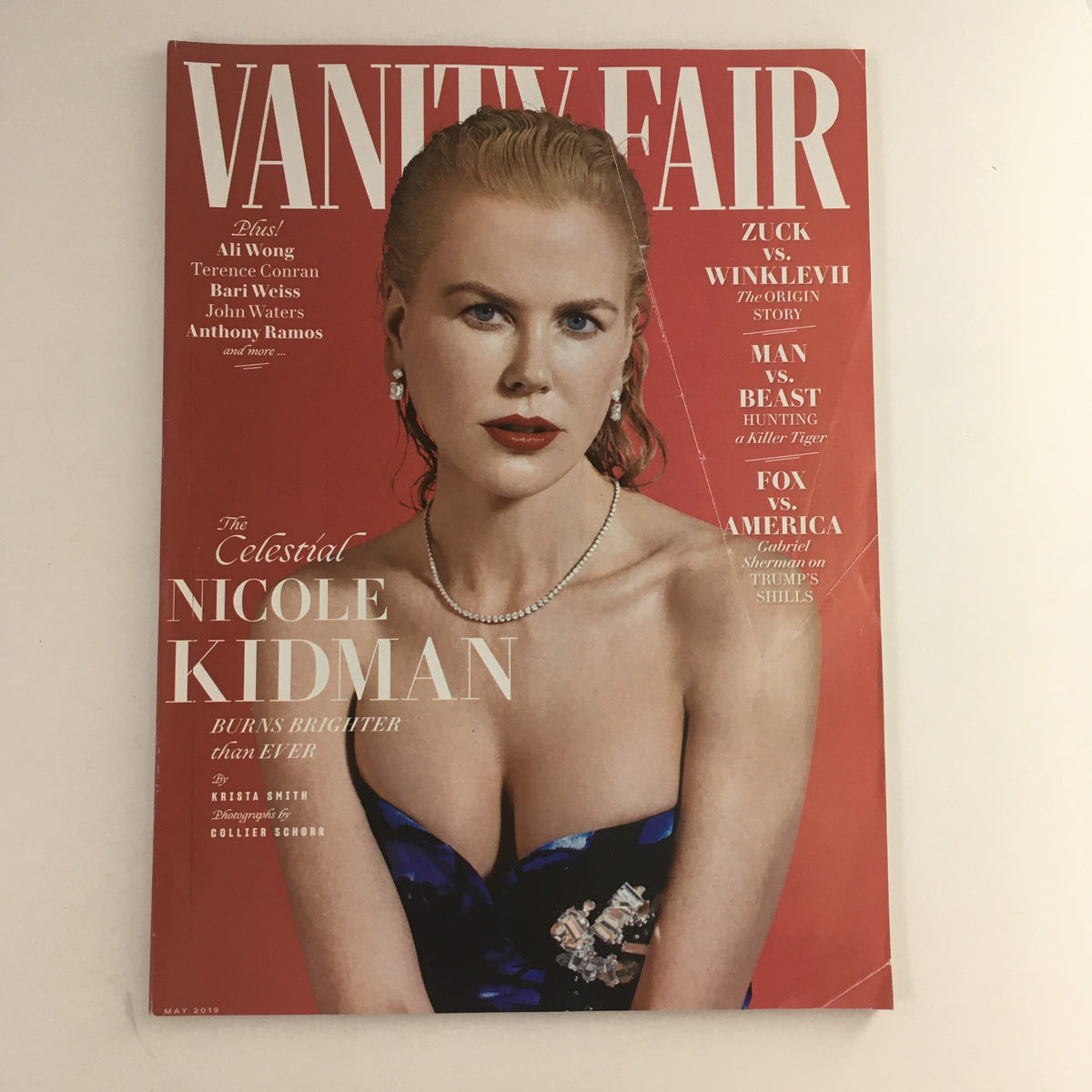 Vanity Fair Magazine May 2019 featuring Nicole Kidman on the cover, showcasing her ethereal beauty and captivating presence in a stunning blue dress. This edition highlights her significant contributions to the film industry.