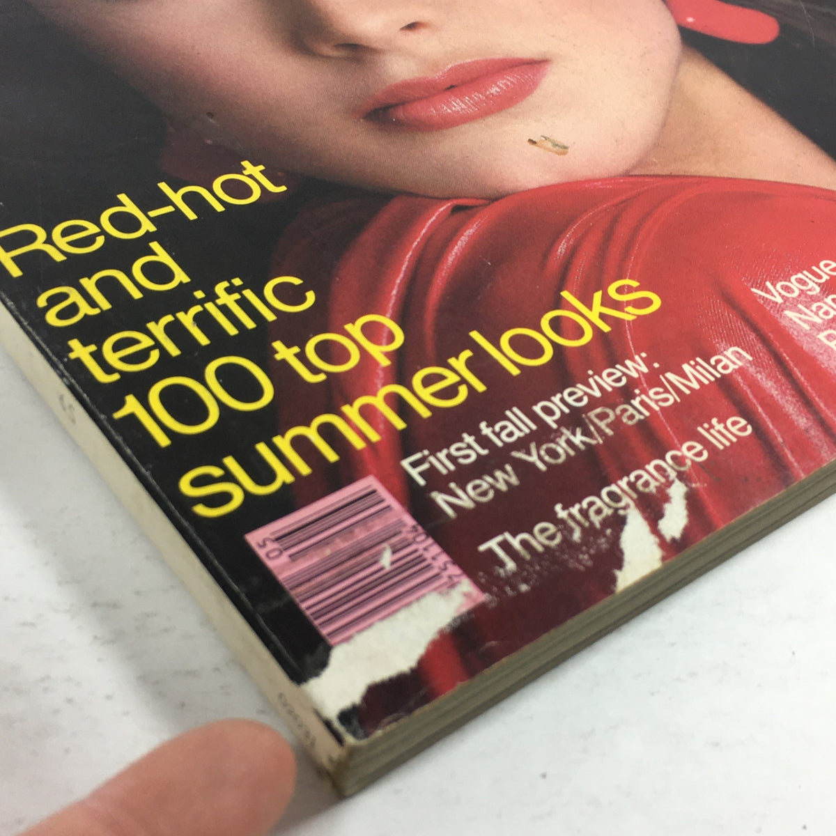 Close-up view of the vintage Vogue Magazine from May 1981 featuring Brooke Shields on the cover, highlighting the text 'Red-hot and terrific 100 top summer looks' and showing wear characteristic of its age.