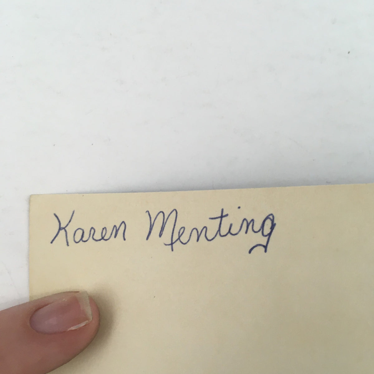 Handwritten name 'Karen Menting' on a page from the 1973 Vintage Book Meet Elvis Presley by Favius Friedman, indicating a personal note or signature.