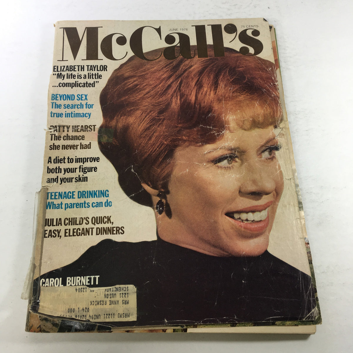 Vintage McCall's Magazine from June 1976 featuring Carol Burnett on the front cover, showing minor wear and a plastic protective covering.
