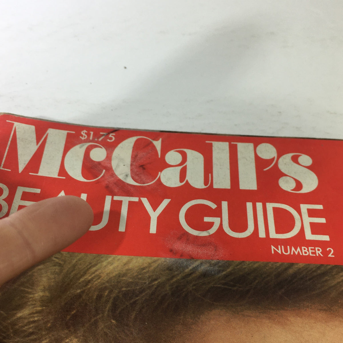 Close-up of the front cover of VTG McCall's Beauty Guide #2 Magazine from 1980, featuring vintage design and price details.