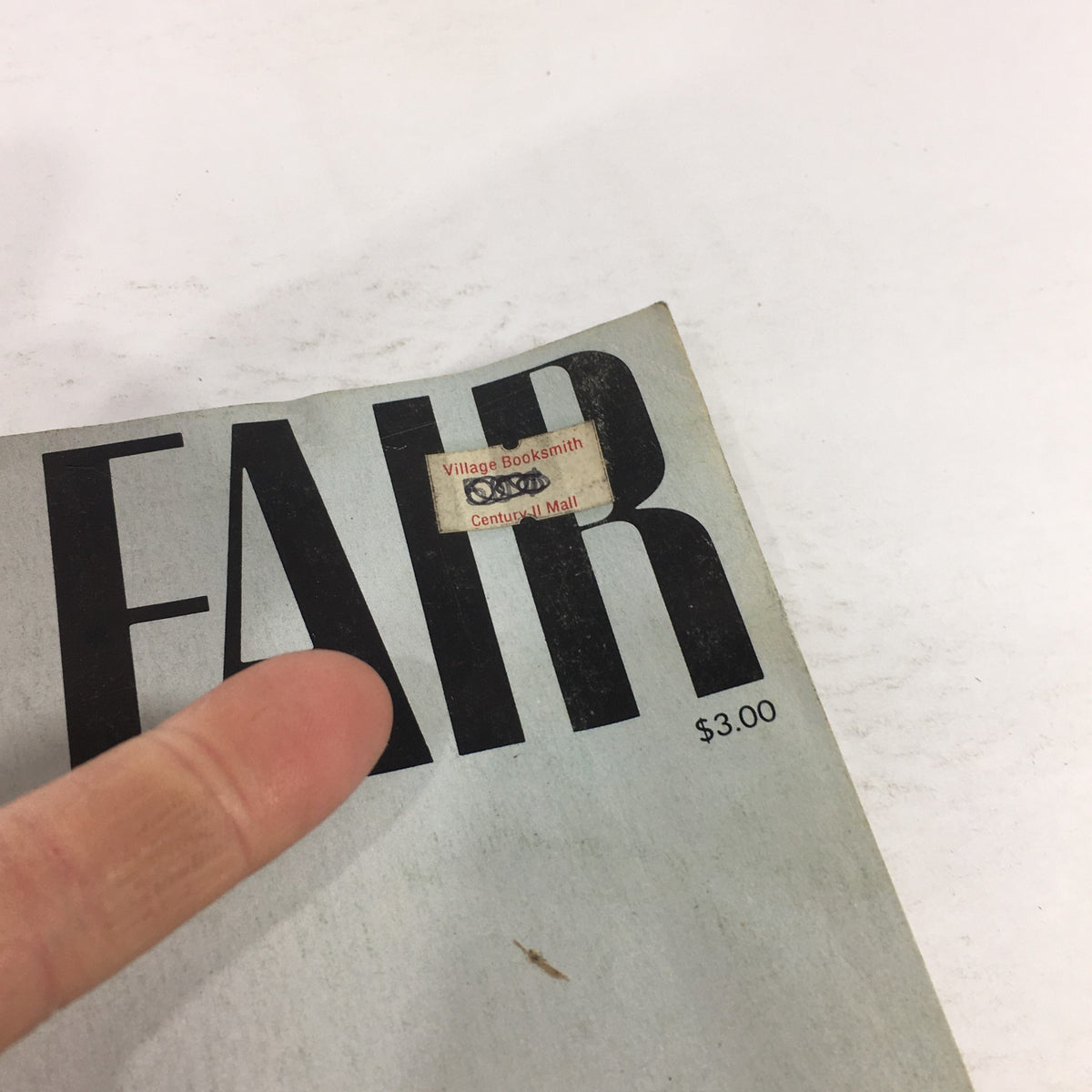 Close-up of the cover of VTG Vanity Fair Magazine: April 1983 highlighting the price sticker and wear typical of a collectible vintage magazine.
