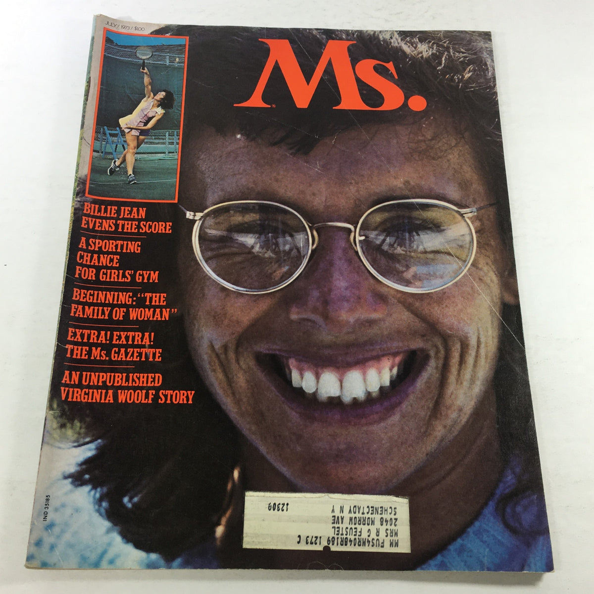 Cover of VTG MS. Magazine: July 1973 featuring an article titled 'Billie Jean Evens The Score' and an unpublished Virginia Woolf story, showcasing a smiling woman wearing glasses.
