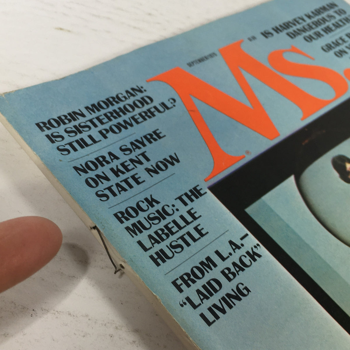 Close-up of the cover of Vintage MS. Magazine: September 1975. The cover displays headlines about women’s rights and social issues, showcasing its historical significance in the feminist movement.