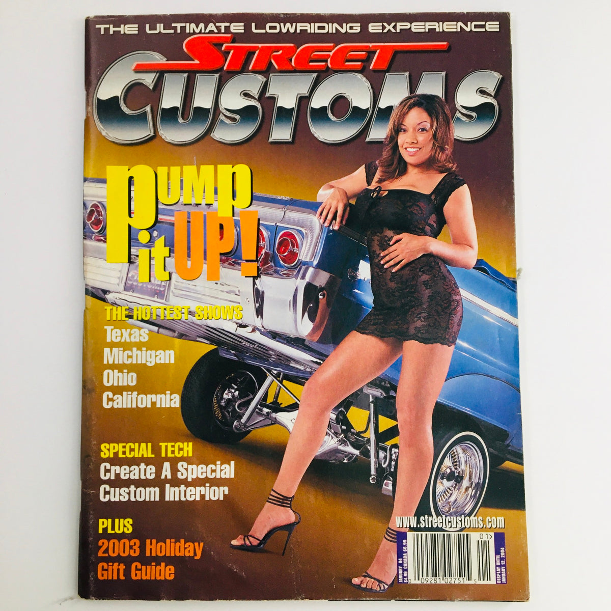 Cover of Street Customs Magazine January 2004 titled 'Pump It Up!' showcasing a model posing beside a custom lowrider car, highlighting the hottest shows.