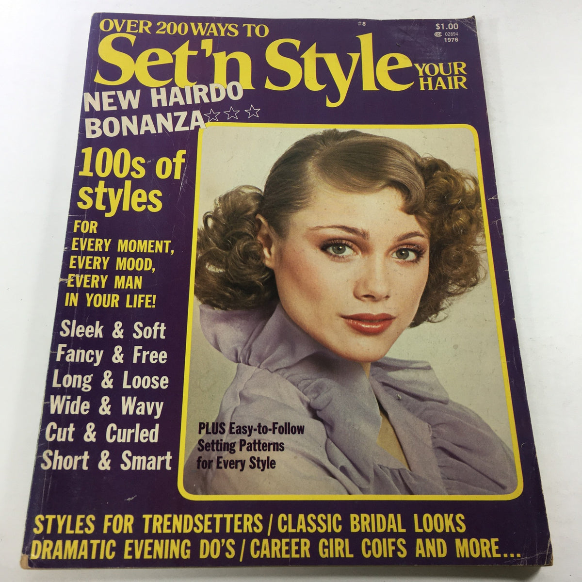 Cover of the VTG Set'N Style Magazine: 1976 featuring a model with fashionable curls, showcasing various hairstyles and beauty trends of the 1970s.