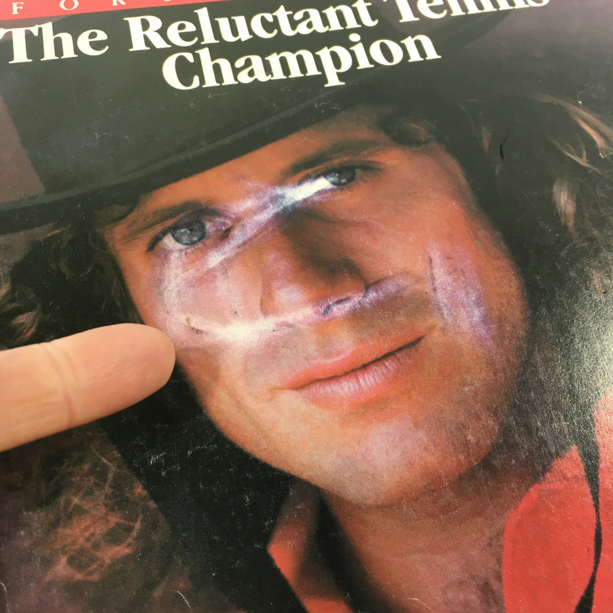 Close-up view of the Vintage Esquire Magazine cover from May 9, 1978, showcasing Guillermo Vilas, the reluctant tennis champion, with a focus on details and wear of the magazine.