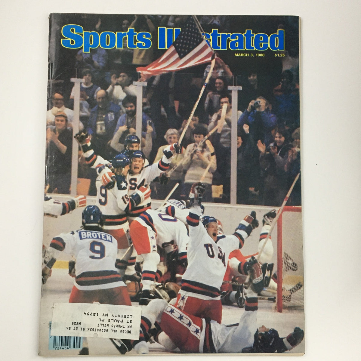Cover of Sports Illustrated Magazine March 3 1980, featuring the U.S.A. Miracle Hockey team celebrating their iconic win at the 1980 Winter Olympics.