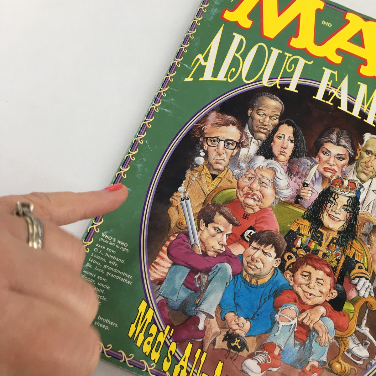 Close-up of the cover of Mad Magazine June 1997 titled 'MAD About Families', showcasing detailed caricatures and characters, including Michael Jackson, highlighting the magazine's unique humor and cultural commentary.
