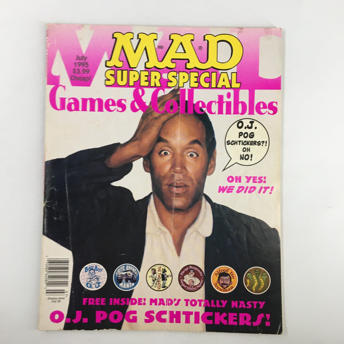 Cover of Mad Magazine July 1995 featuring O.J. Simpson, showcasing the Super Special Games & Collectibles edition with humorous artwork and promotional elements.