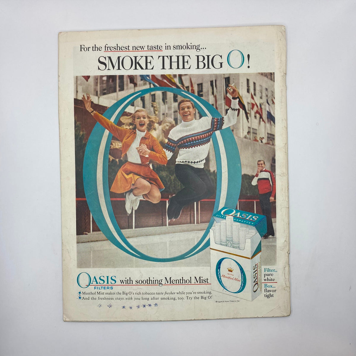 Advertisement page from Saturday Evening Post Magazine, March 1, 1958 promoting Oasis Filters with a vibrant image of a man and woman dancing.