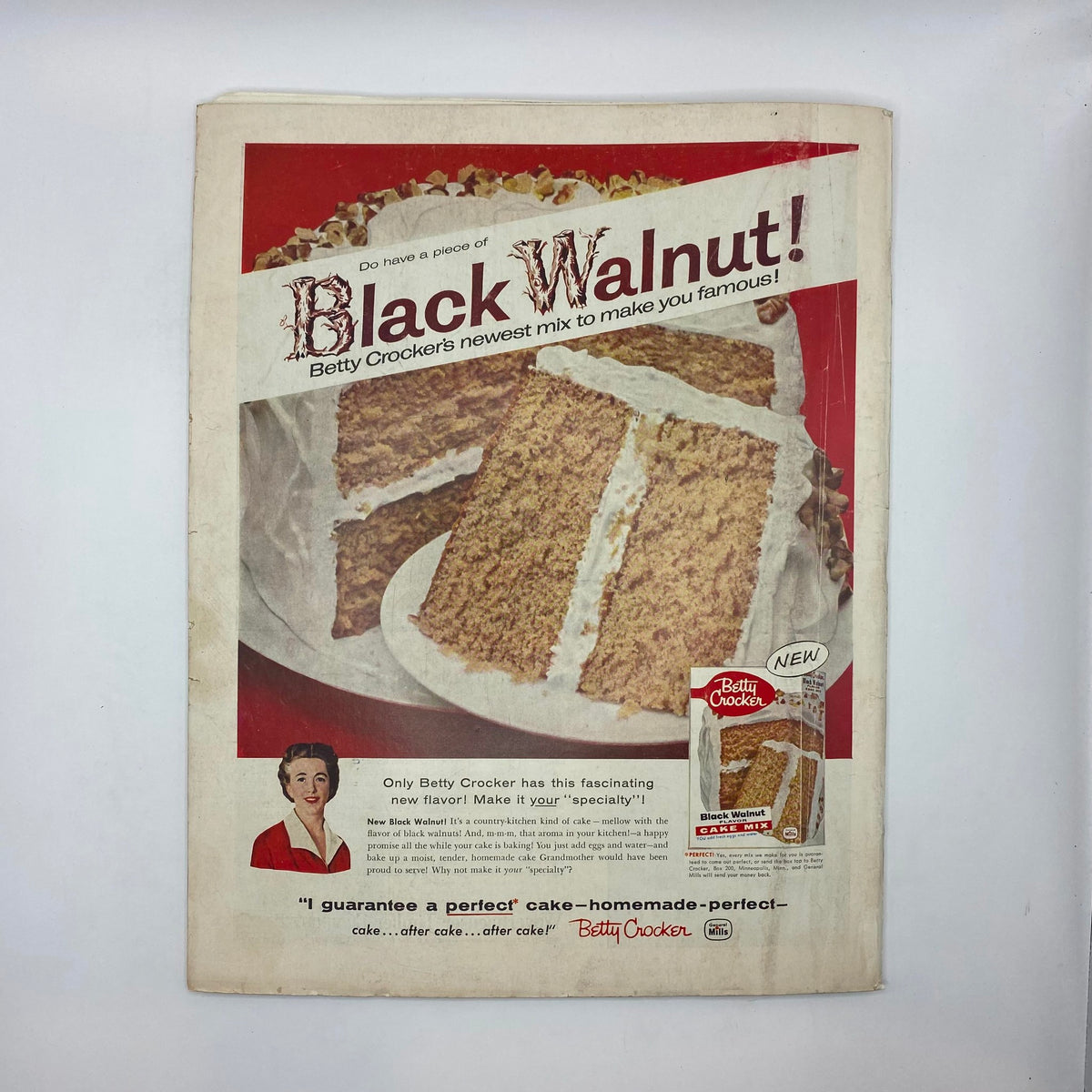Back cover of the February 22, 1958 issue of The Saturday Evening Post magazine, featuring an advertisement for Betty Crocker's Black Walnut cake mix, alongside a vintage design.