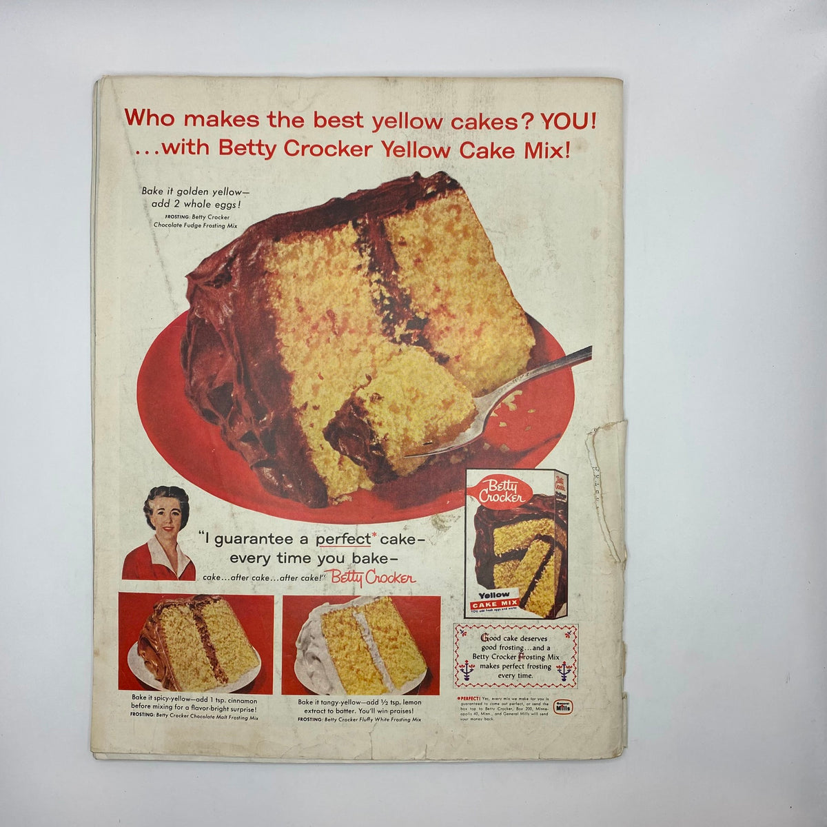 Back cover of Saturday Evening Post Magazine from October 4, 1958, displaying a colorful advertisement for Betty Crocker Yellow Cake Mix, promoting baking tips and features.