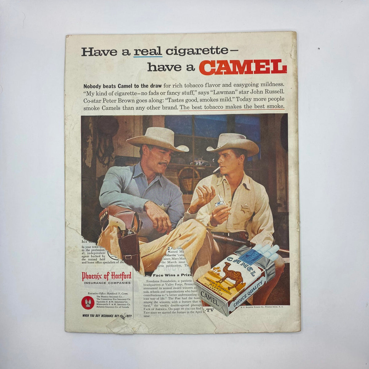 Back cover of Saturday Evening Post Magazine March 28 1959 featuring a Camel cigarette advertisement with two cowboys and branding details.